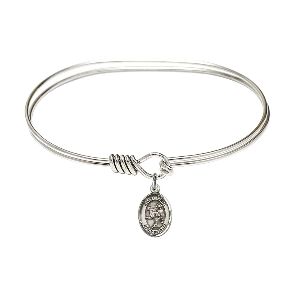 Adult 7" Oval Rhodium Plated Bangle Bracelet with St. Luke the Apostle Medal Charm