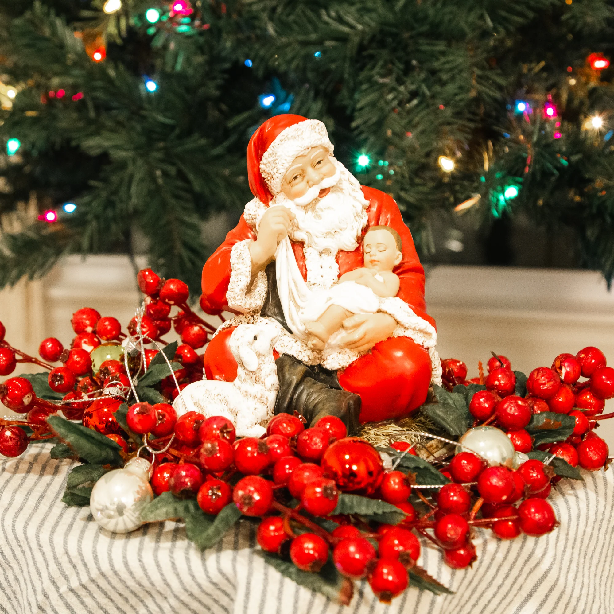 Santa Holding Baby Jesus Figure